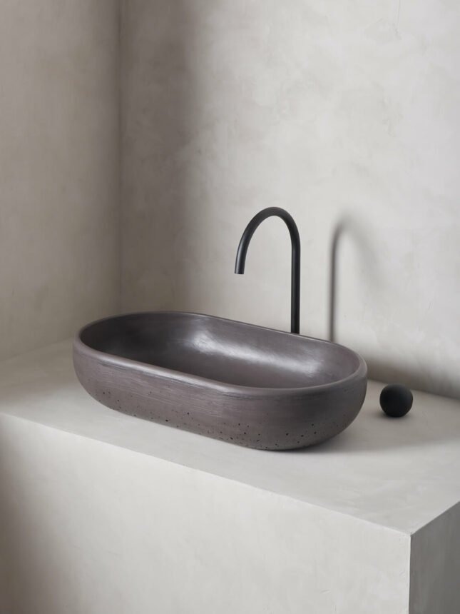 The cerro in lava is an oversized, obround washbowl with softened curves and high, round-over basin walls