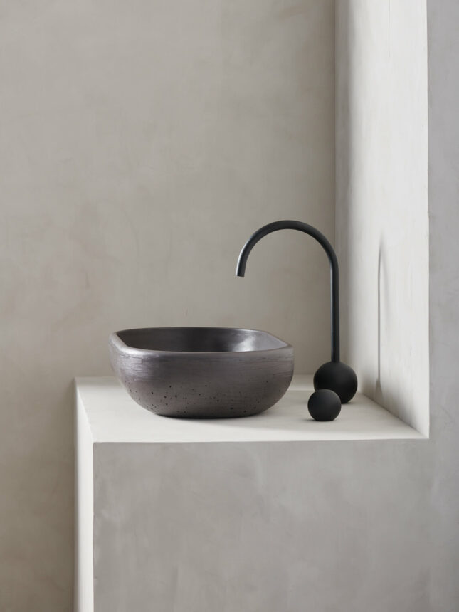 The cerro in lava is an oversized, obround washbowl with softened curves and high, round-over basin walls - a side view