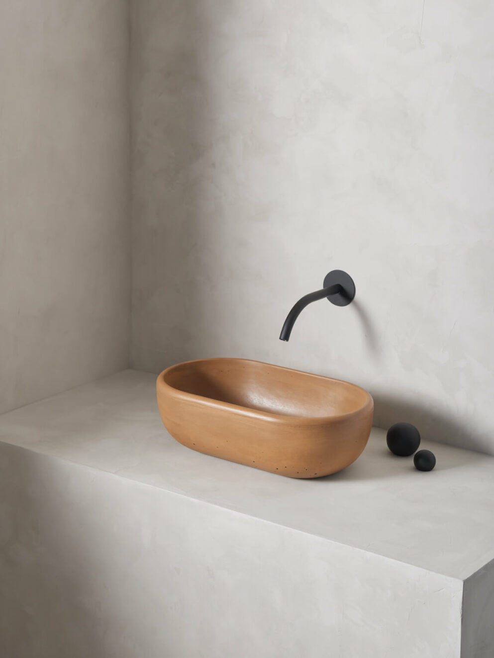 The turo in dune is a petite and obround washbowl with softened curves and high, round-over basin walls.