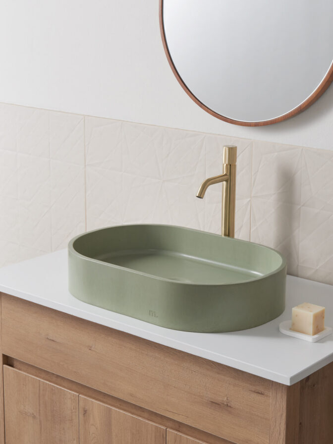 parro lg in thyme in a modern calming bathroom setting with gold hardware and wooden cabinet